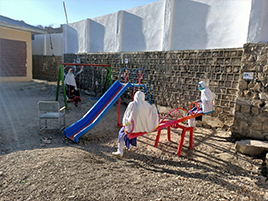 Image of the schoolyard with newly installed playground equipment